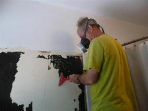 Scraping off old mastic